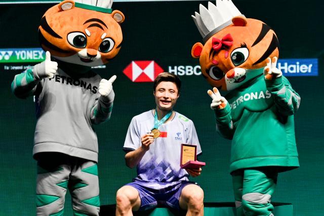 欧洲杯-石宇奇收获赛季首冠 国羽一金四银结束大马公开赛